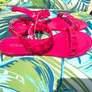 Olivia Miller hot pink jelly slingback sandals.